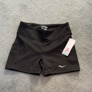 Two pairs of Saucony size medium run shorts - bundle